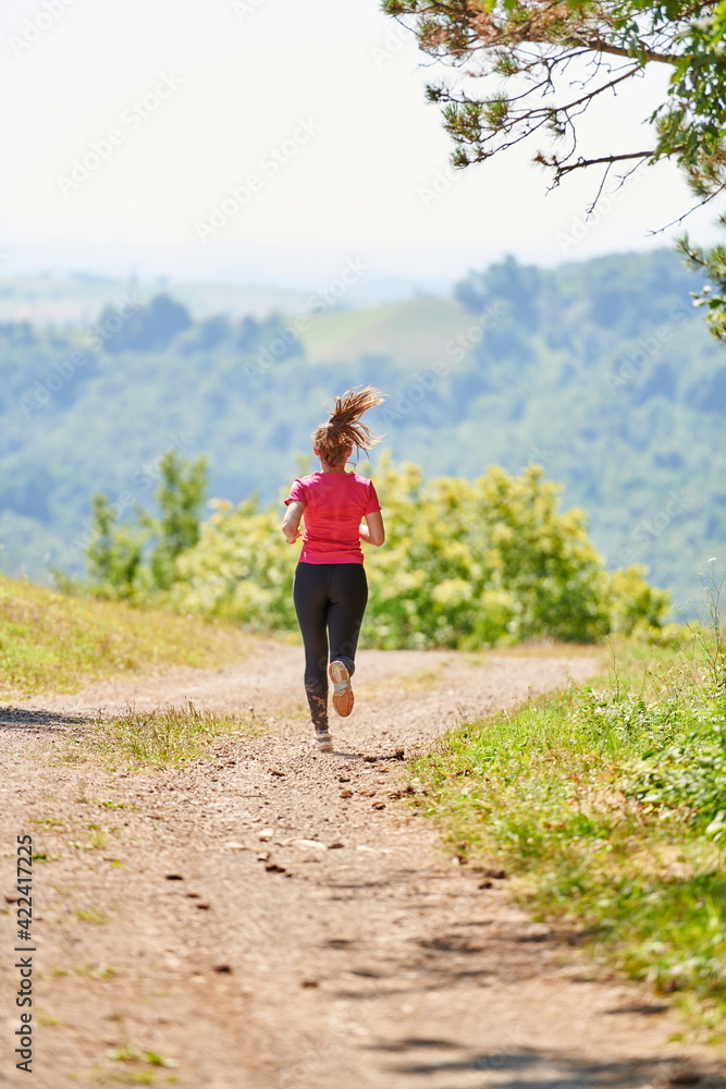 woman enjoying in a healthy lifestyle while jogging