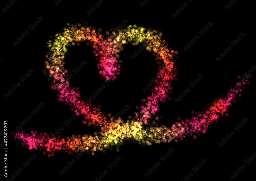 Sparkling shiny particles in the colors red, yellow, gold, orange and pink form a line to form a magical heart shape love sign with black background