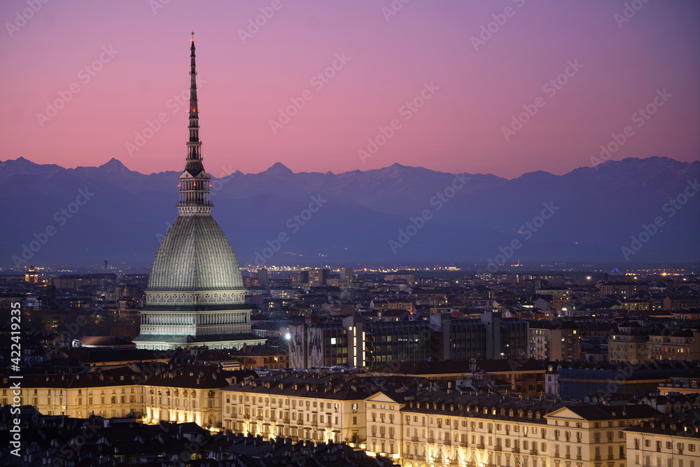 Night view of the illuminated Mole Antonelliana. Turin, Italy - March 2021