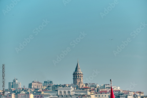 Turkey istanbul 04.03.2021. Famous galata tower of istanbul taken photo from istanbul bosporus. it is established by genoese sailors for watching of bosporus of constantinople.