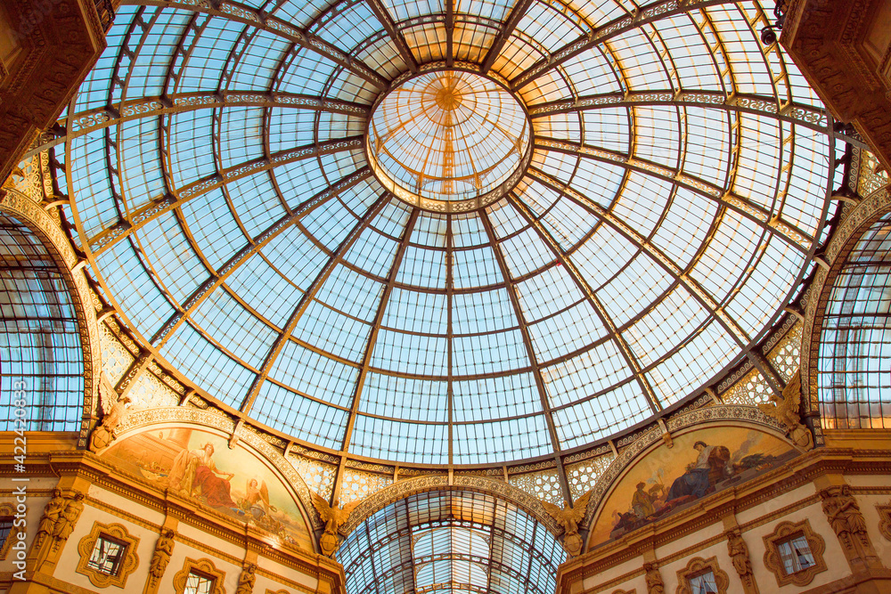 Dome of the Galleria Vittorio Emanuele II with a glow of light that illuminates the painting