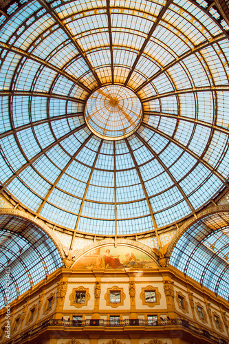 Vittorio Emanuele II gallery dome with glow of light that illuminates the frescoDome of the Galleria Vittorio Emanuele II with a glow of light that illuminates the painting
