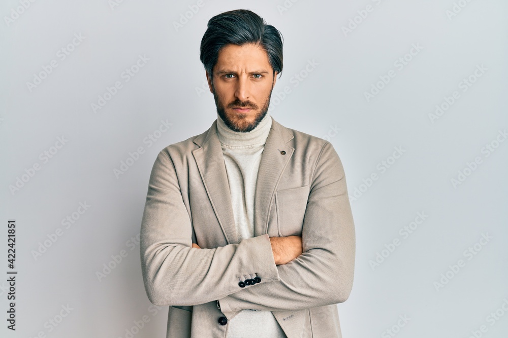 Young hispanic man with arms crossed gesture skeptic and nervous, frowning upset because of problem. negative person. Young hispanic man with arms crossed gesture skeptic and nervous, frowning upset because of problem. negative person.
