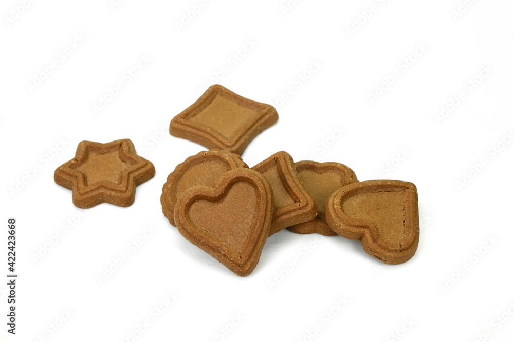 Biscuits isolated on white. Chocolate cookies of different shapes isolated on white background. Biscuits isolated on white. Chocolate cookies of different shapes isolated on white background.