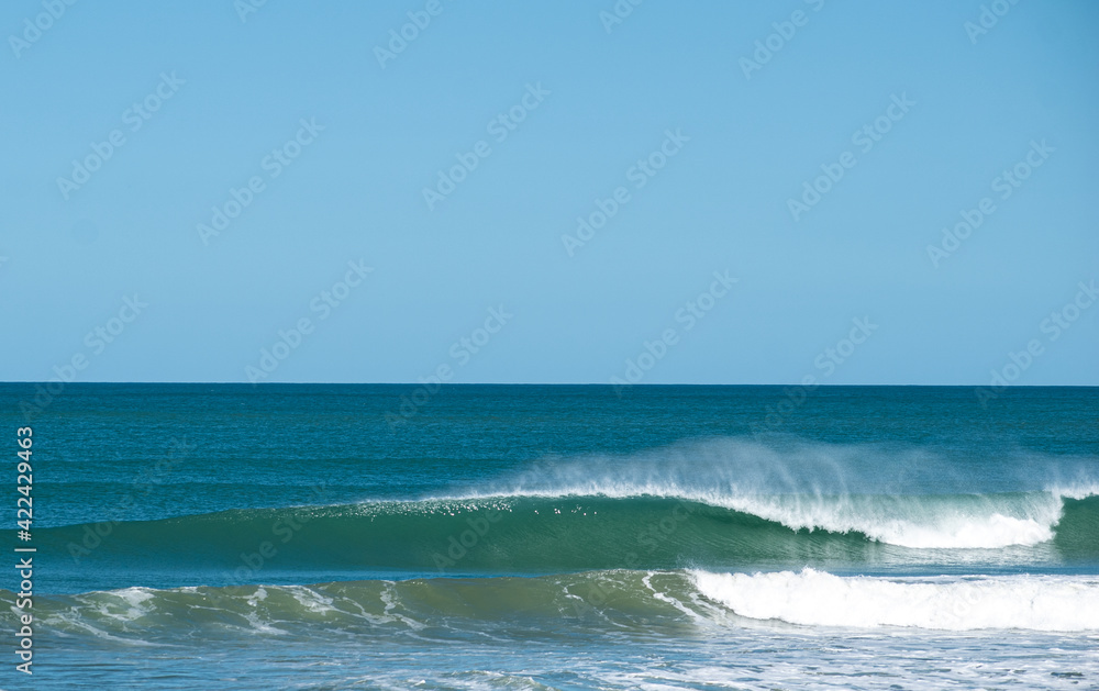 perfect wave breaking on the beach perfect wave breaking on the beach