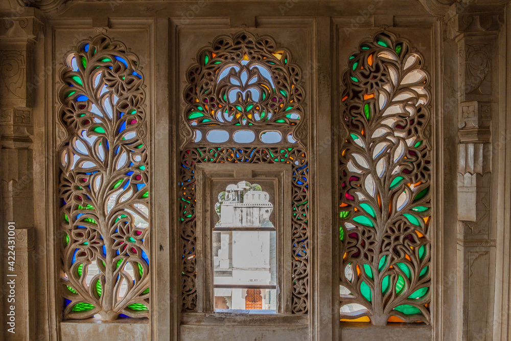 Decorated windows of the City palace in Udaipur, Rajasthan state, India