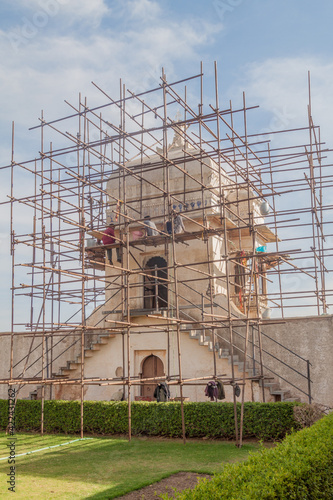 CHITTORGARH, INDIA - FEBRUARY 15, 2017: Tower at Padmini Palace at Chittor Fort in Chittorgarh being renovated, Rajasthan state, India photo