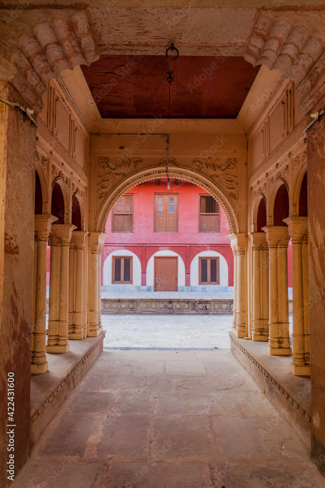 Colonnaded way into a courtyard in Vrindavan, Uttar Pradesh state, India