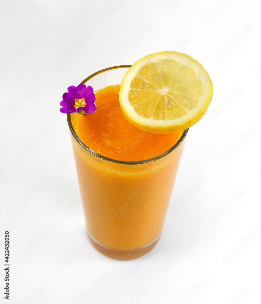 Glass of milkshake or cocktail isolated on white background. Mango, grapefruit, tangerine mix. Glass of milkshake or cocktail isolated on white background. Mango, grapefruit, tangerine mix.