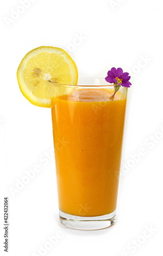 Glass of milkshake or cocktail isolated on white background.  Mango  grapefruit  tangerine mix. 