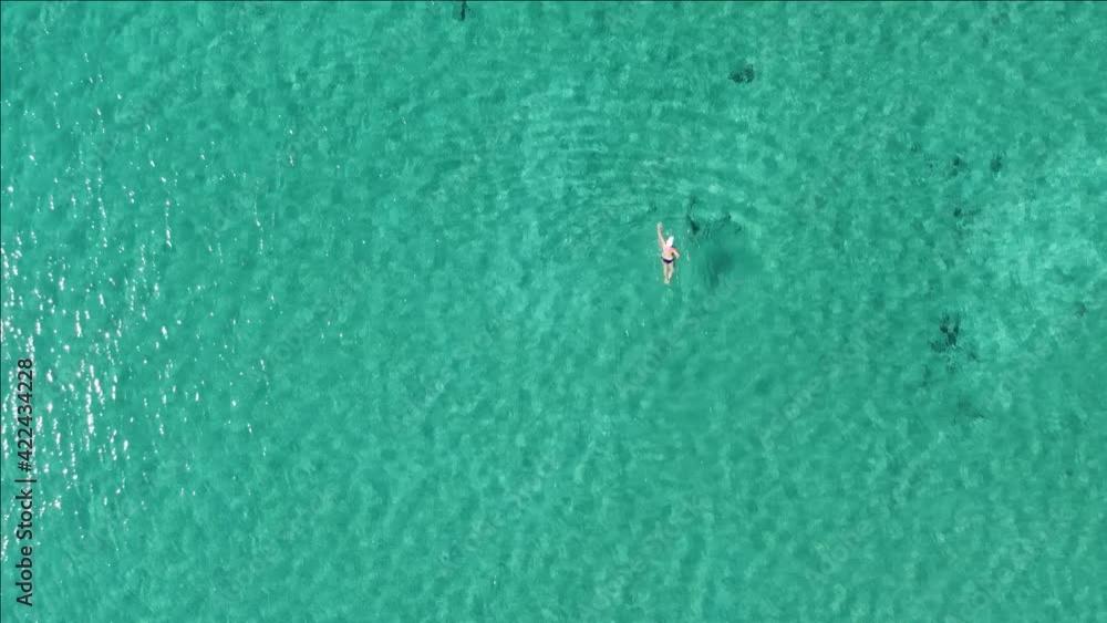 Aerial top down video of a swimmer Aerial top down video of a swimmer