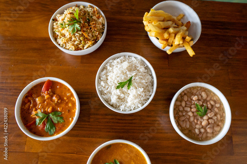 food bowls: rice, seafood, shrimp, beans, chips - side dishes