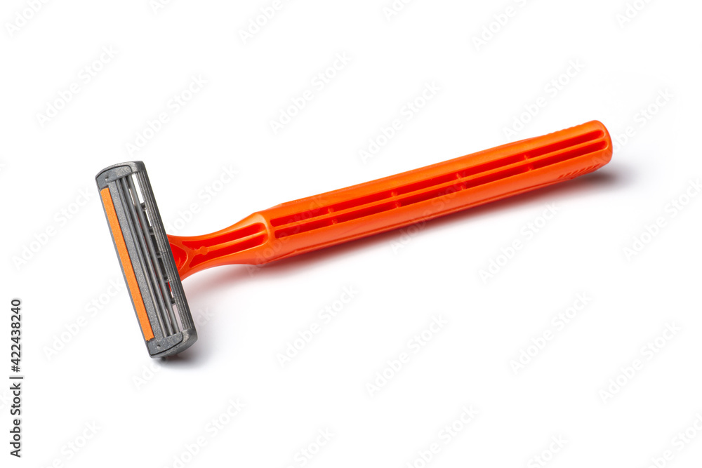 Three blades orange razor isolated on white blackground