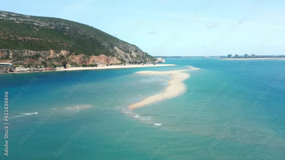 Lingua areia, Portinho da Arrabida, Portugal. Astonishing seascape with crystal clear waters as seen from the top. Aerial view of a picturesque cliff nestling over the sea. High quality 4k footage Lingua areia, Portinho da Arrabida, Portugal. Astonishing seascape with crystal clear waters as seen from the top. Aerial view of a picturesque cliff nestling over the sea. High quality 4k footage