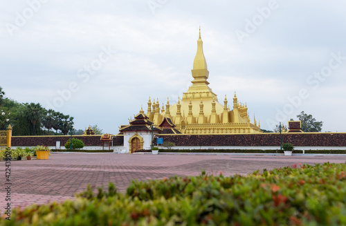 Pha That Luang Vientiane, Laos. That-Luang Golden Pagoda in Vientiane, Laos. Pha That Luang at Vientiane. Blue sky background beautiful.