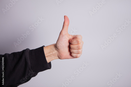 You did it hand gesturing thumb up isolated on white background
