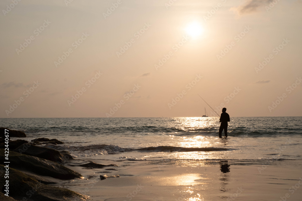 Evening light with beach fishermen