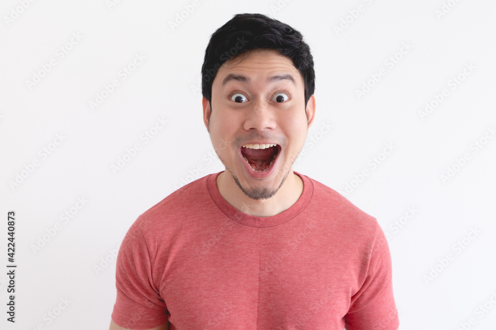 Wow and shocked face of funny Asian man isolated on white background. Wow and shocked face of funny Asian man isolated on white background.