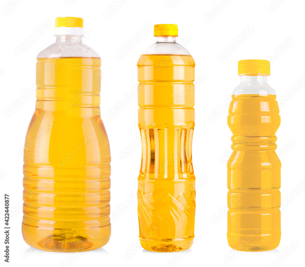Bottles of sunflower oil isolated on white background. Bottles of sunflower oil isolated on white background.