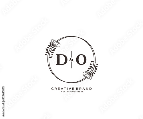 initial DO letters hand drawn feminine and floral botanical logo suitable for spa salon skin hair beauty boutique and cosmetic company.