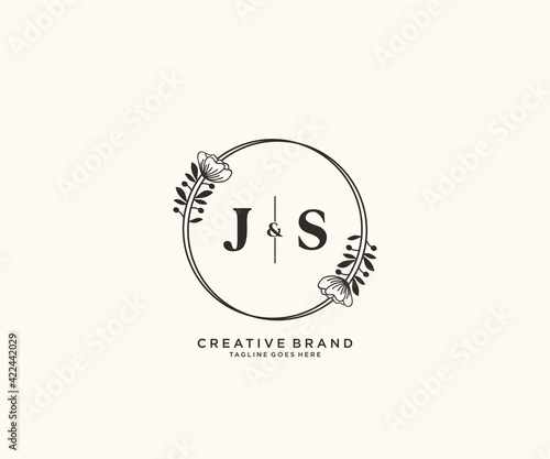 initial JS letters hand drawn feminine and floral botanical logo suitable for spa salon skin hair beauty boutique and cosmetic company.