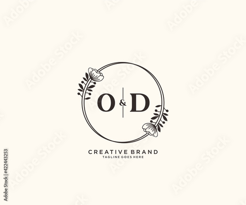 initial OD letters hand drawn feminine and floral botanical logo suitable for spa salon skin hair beauty boutique and cosmetic company.