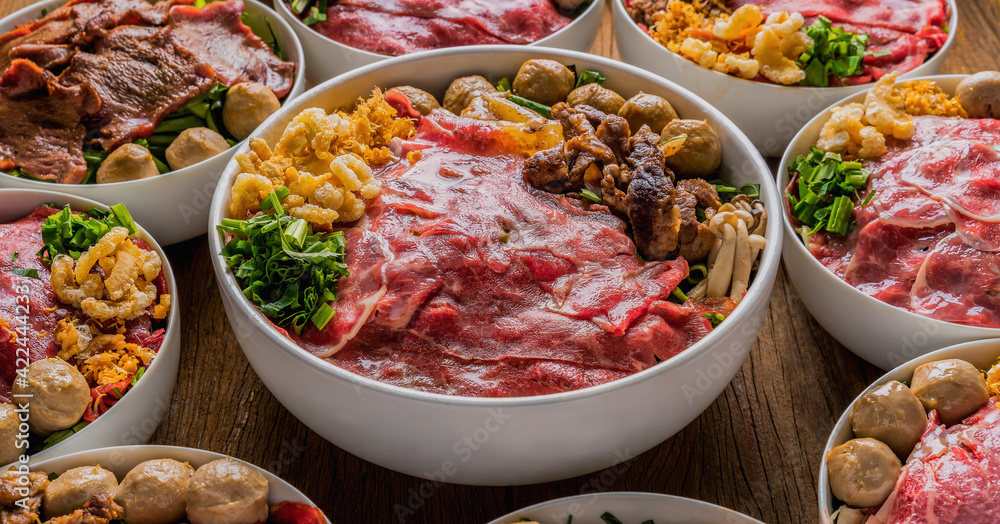 Thai style beef noodle with fresh sliced beef, stewed beef, beef meatball Thai style beef noodle with fresh sliced beef, stewed beef, beef meatball