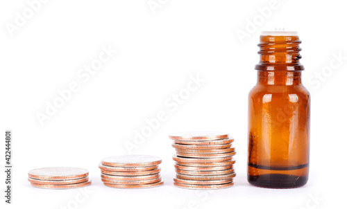 Dollar coins and medicine bottles