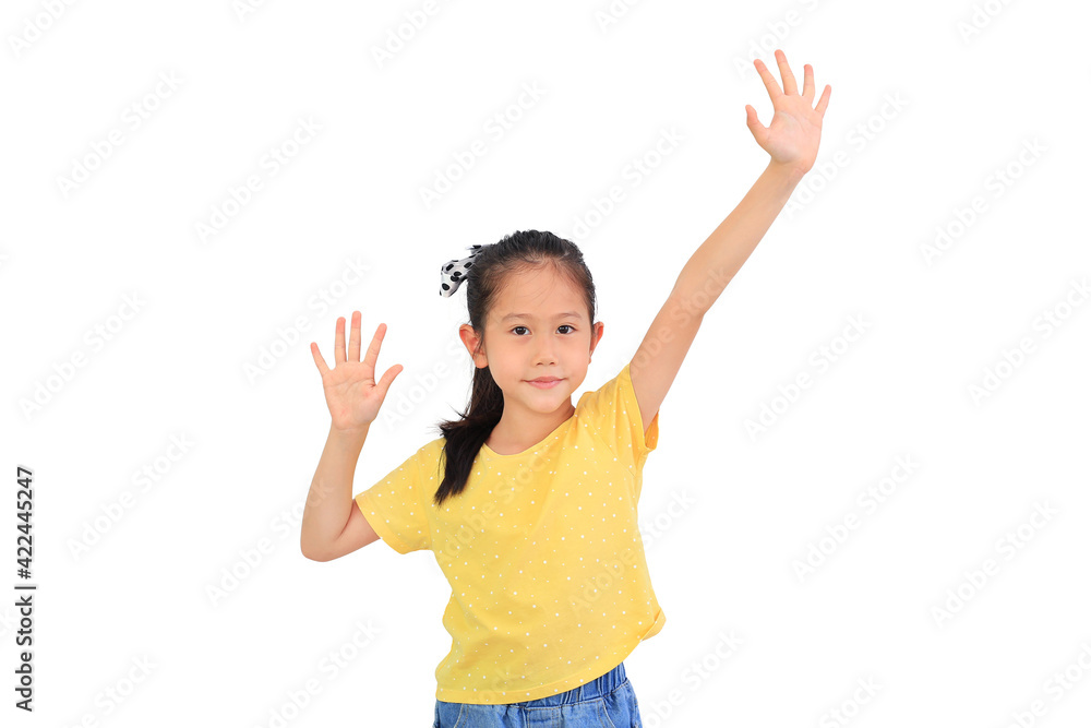 Smiling Asian little child girl holding hands up isolated on white background. Question and answer concept Smiling Asian little child girl holding hands up isolated on white background. Question and answer concept