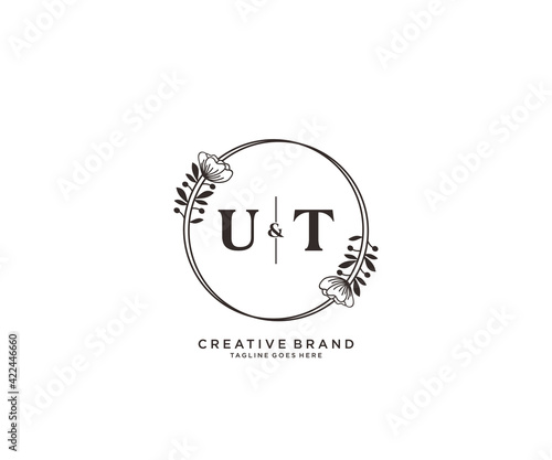 initial UT letters hand drawn feminine and floral botanical logo suitable for spa salon skin hair beauty boutique and cosmetic company.