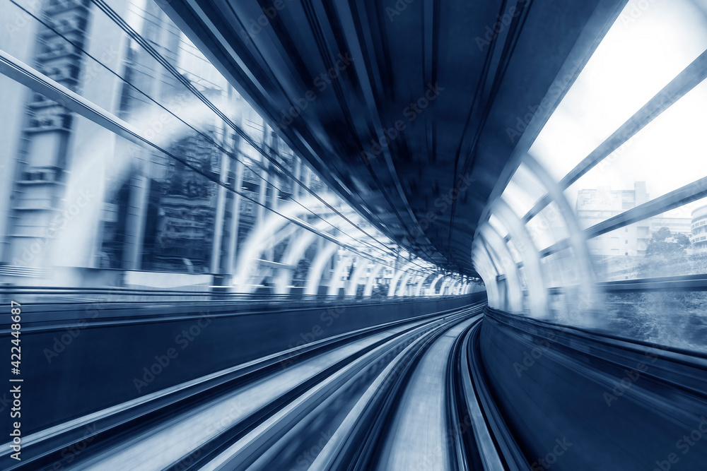 Motion blur of train moving inside tunnel