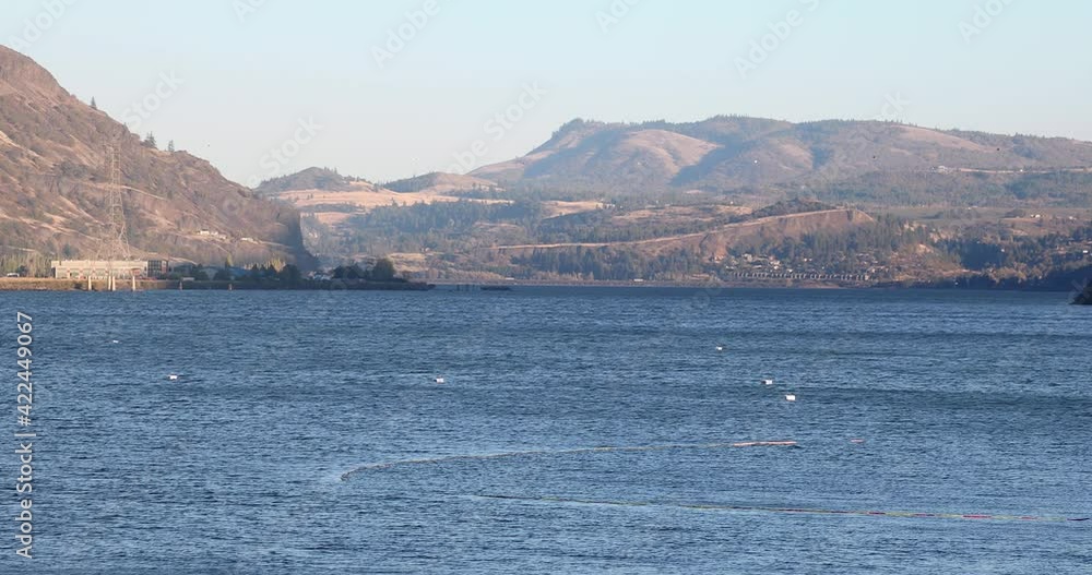 Hood River, Columbia River Gorge rolling landscape, tranquil water flow Hood River, Columbia River Gorge rolling landscape, tranquil water flow