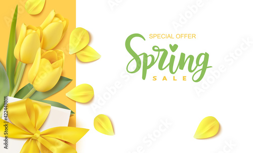 Spring sale design template. Calligraphic lettering text with decorative gift box and yellow tulip flower. Vector stock illustration.