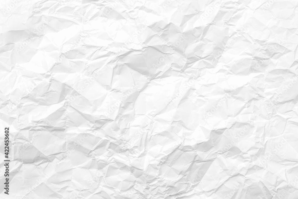 Fototapeta premium White crumpled paper texture background. Clean white paper. Top view.