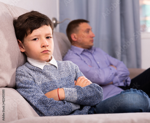 Canvastavla Portrait of offended tweenager after disagreements with his father at home
