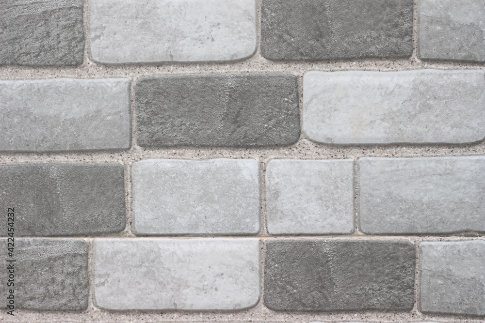 Brick shaped background with marble motif in gray and dark gray tones Brick shaped background with marble motif in gray and dark gray tones