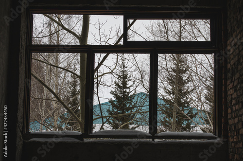 broken window in an abandoned building. photo of stalkers