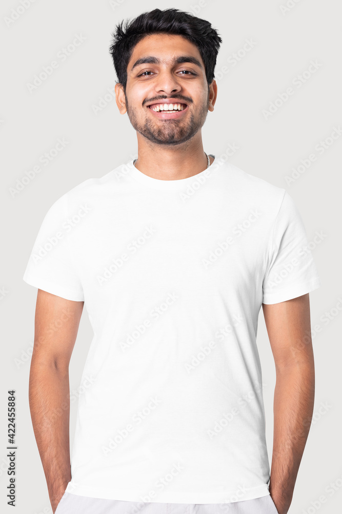Indian man in simple white tee studio portrait Indian man in simple white tee studio portrait