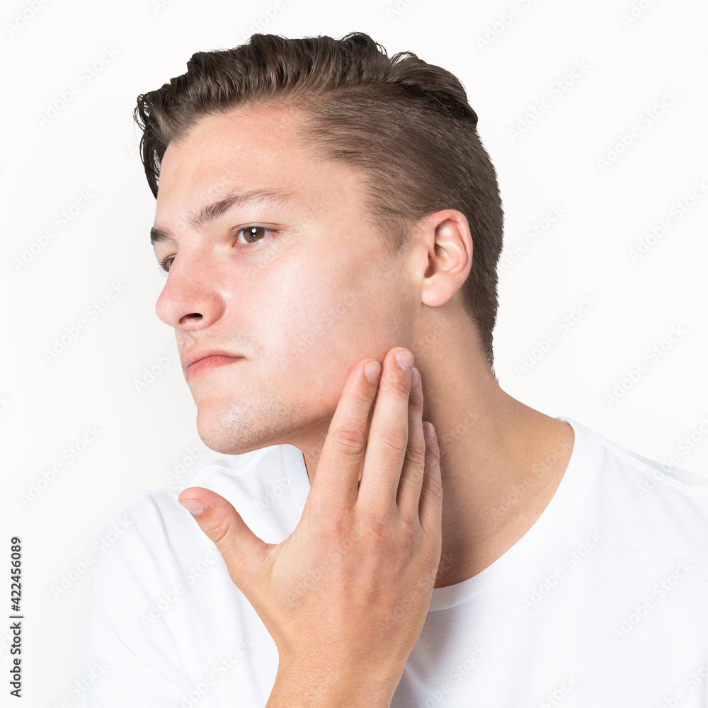 Fototapeta premium Handsome man candid portrait for skincare photoshoot