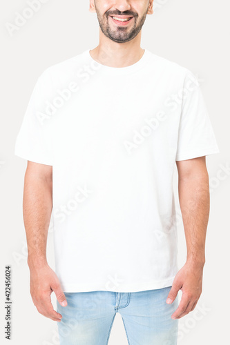 Man in simple white tee studio portrait