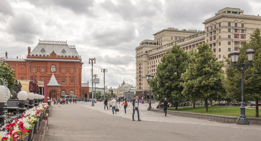 Pedestrians walk through the streets of Moscow