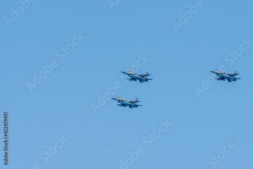 Three military aircraft in the sky in Tel Aviv. Independence Day in Israel, a national holiday. Celebrations. Israel Air Force parade