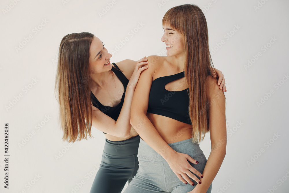 A beautiful girls is engaged in a yoga studio A beautiful girls is engaged in a yoga studio