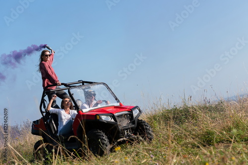  colorful torches while driving a off road buggy car