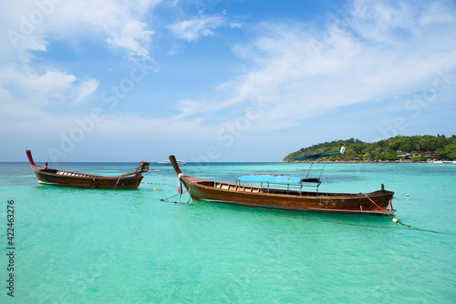 Longtails boats for tourists at Pattaya beach, koh Lipe © Teeradej