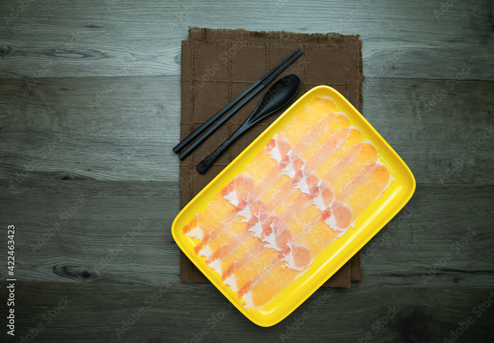 fresh raw pork, meat ,beef, belly, sliced on square plate on wood, wooden background,set shabu, hot pot ingredients. fresh raw pork, meat ,beef, belly, sliced on square plate on wood, wooden background,set shabu, hot pot ingredients.