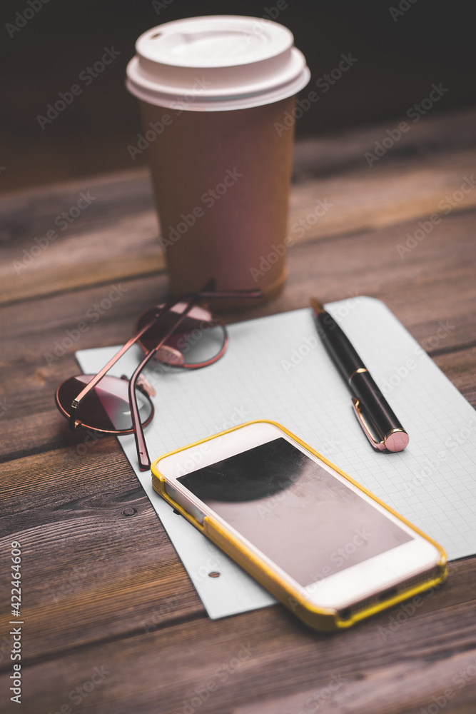 office desk documents notepad glasses mobile phone coffee cup office desk documents notepad glasses mobile phone coffee cup