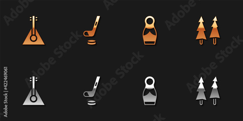 Set Balalaika, Ice hockey stick and puck, Russian doll matryoshka and Christmas tree icon. Vector