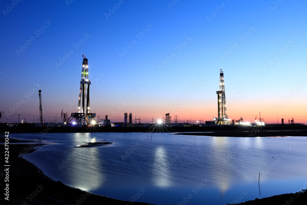In the evening of oilfield derrick In the evening of oilfield derrick