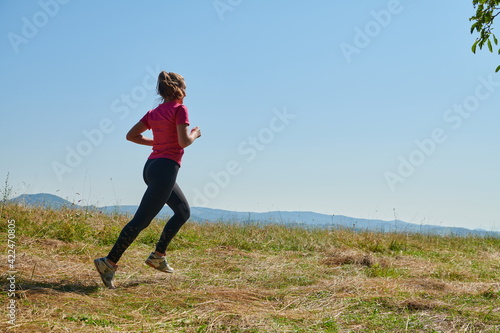 woman enjoying in a healthy lifestyle while jogging